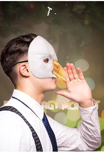Detailed side view of an eagle half-mask with realistic feather textures and yellow beak