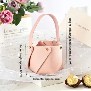 Pink faux leather mini gift bucket with gold rivets for wedding favors and candies