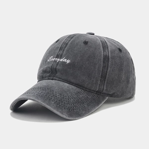 Close-up of vintage washed grey cotton baseball cap with white Everyday embroidery