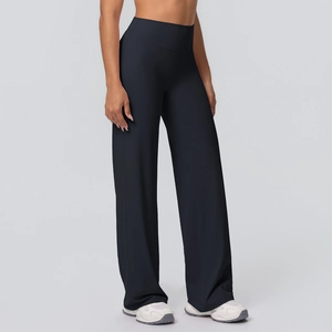Detail view of high waisted black flared yoga pants with soft brushed matte texture