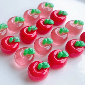 Mini resin red apple charms arranged in a heart shape for DIY phone case accessories