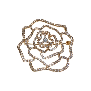Exaggerated gold hollow flower brooch with sparkling white rhinestones for women
