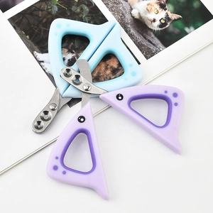 Detailed view of dual-hole pet nail clippers in blue and purple cat-shaped design