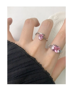 Detailed view of S925 silver rings featuring pink pear and rectangular cut zircon gems