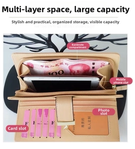 Detail view of the long wallet interior showing spacious cash and smartphone compartments