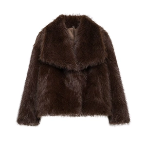 Close-up of the plush texture and large lapel of this brown faux fur short coat
