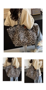 Detail of leopard print canvas tote bag featuring brown leather side patch branding