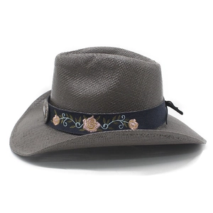 Brown woven western cowboy straw hat with floral embroidery and vintage metal concho
