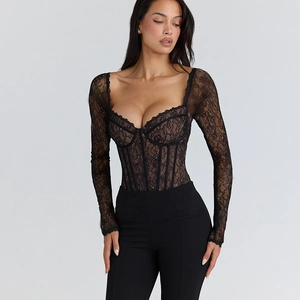 Close-up of black lace bodysuit featuring boning structure and long sleeves on a model