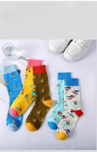 Set of five cotton crew socks with vibrant sports patterns and summer athletic theme