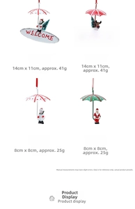 Detail of Christmas iron parachute ornaments with snowman and reindeer welcome signs