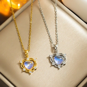 Elegant heart moonstone pendant necklaces in gold and silver finish with zircon accents