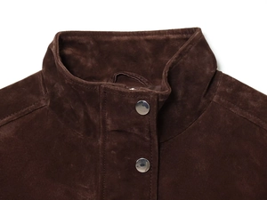 Detailed view of the dark brown suede bomber jacket collar with silver metal snap buttons