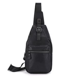 Detailed view of genuine leather chest bag with premium silver zippers and hardware