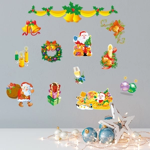 Christmas wall stickers set featuring Santa, bells, and wreaths on a grey festive wall