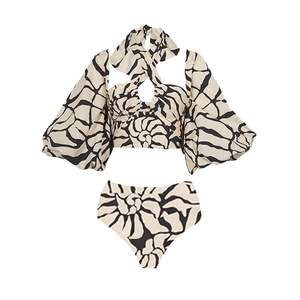 Detail of long sleeve halter top and high-waist bikini bottom with shell pattern print
