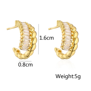 Detail view of 18K gold plated C-shaped hoop earrings with clear cubic zirconia size specs