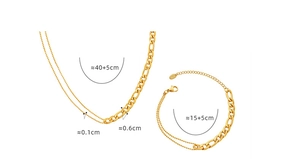Detailed view of layered gold chain set with bead and curb link splicing texture