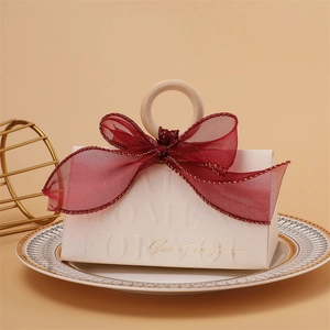 Champagne triangular wedding gift box with wooden ring handle and dark red ribbon bow