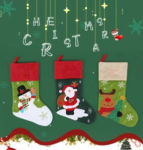 Three-piece linen Christmas stockings featuring Santa, snowman, and reindeer embroidery