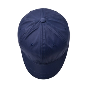 Top-down view of a navy blue short brim baseball cap in premium twill fabric texture
