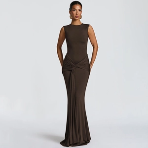 Detail of deep brown bodycon maxi dress featuring a twisted knot and elegant drapes