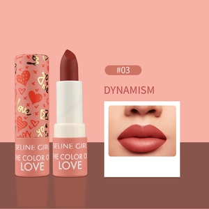 Close-up of matte lipstick shade #03 DYNAMISM with heart-patterned pink paper packaging