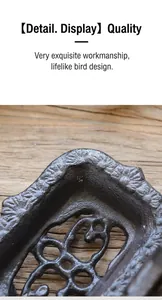 Détails macro d'un porte-savon en fonte rustique avec finition texturée et relief d'oiseau