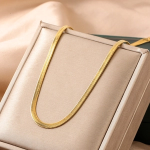 Classic gold herringbone snake chain necklace made of stainless steel in jewelry box