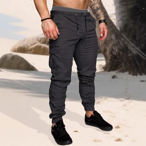 Men's dark grey cargo joggers with multiple pockets and elastic drawstring waist