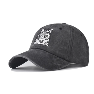 Washed dark grey baseball cap featuring a white embroidered cat face on a vintage style