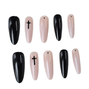 Gothic stiletto press-on nails set with black crosses and minimalist dot patterns