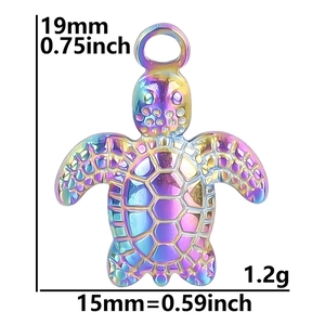 Detailed view of iridescent sea turtle pendant with size and weight measurements