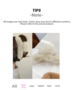 Detail of a large cream plush hair claw clip showing textured fur and back hair styling