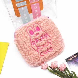 Pink plush sanitary bag with cute rabbit embroidery and zip closure for daily storage