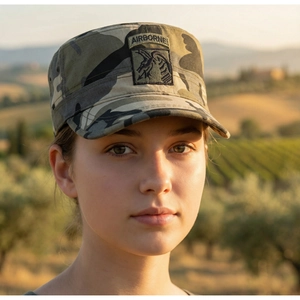Detailed view of camo military cadet hat featuring an airborne eagle patch embroidery