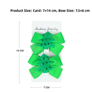 Detail of Christmas tree green bow hair clips set on display card for girl accessories