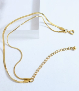 Detail of gold-plated double-layer snake chain with adjustable lobster clasp closure