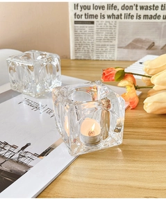 Detailed close-up of water ripple texture on an ice-cube shaped glass candle holder