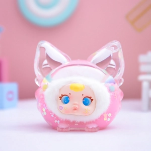 Close-up of cute figurine with pink cat-ear hood, blue eyes and white plush trim detail