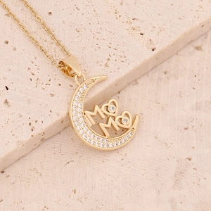 Copper necklace with zircon-encrusted crescent moon and heart MOM pendant on stone background
