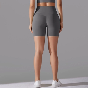 Rear view of high-waisted seamless dark gray yoga shorts with lifting effect