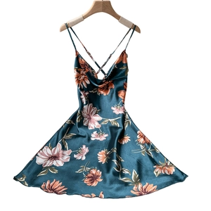 Elegant floral silk satin slip dress with cross-back straps and deep teal floral print