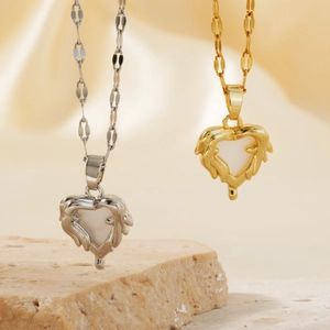 Minimalist heart pendant necklace in gold and silver finish with mother of pearl inlay