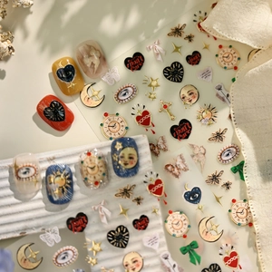Vintage art style nail stickers featuring retro clocks, hearts, and moon face patterns
