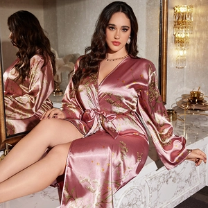 Elegant women's pink satin floral bathrobe with a matching waist tie and kimono style