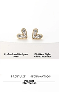 Detailed view of heart stud earrings with cubic zirconia inlay and gold plating