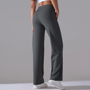 Back view of high-waisted flared yoga pants with drawstring and side pockets