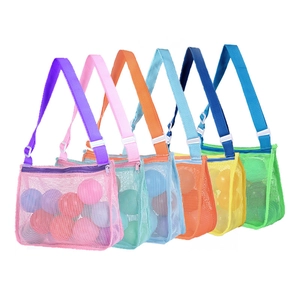 Variety of colorful mesh beach bags for kids in six colors with adjustable straps