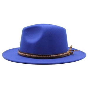 Close-up of royal blue wool jazz hat featuring a brown braided leather band detail